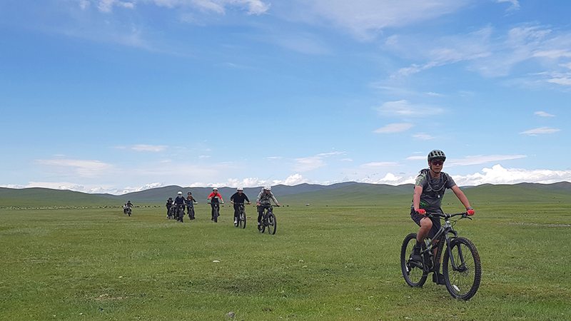 Cycling in Mongolian grassland